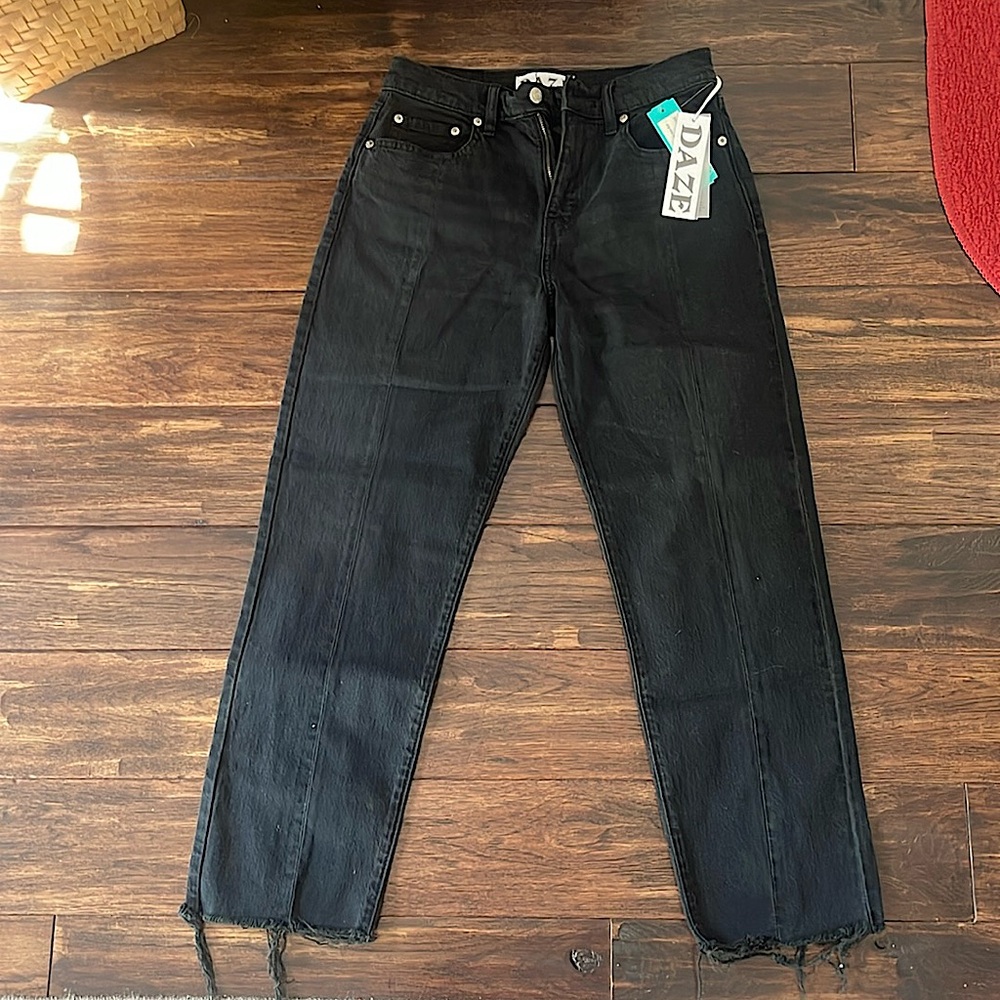Straight Up high rise straight Daze Denim. Frayed at bottoms w/ seam down middle